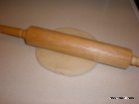 rolling of pizza dough